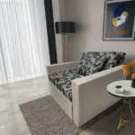 Fábia ágyneműtartós fotelágy ezüst serlegszürke szövet