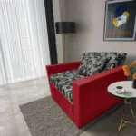 Fábia ágyneműtartós fotelágy japán karminvörös szövet