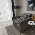 Fábia ágyneműtartós fotelágy mély földszürke szövet