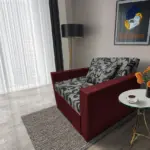 Fábia ágyneműtartós fotelágy ódon borvörös szövet