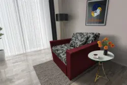 Fábia ágyneműtartós fotelágy ódon borvörös szövet