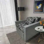 Fábia ágyneműtartós fotelágy óezüst szövet