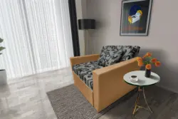 Fábia ágyneműtartós fotelágy okker szövet