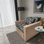 Fábia ágyneműtartós fotelágy világos fahéj szövet