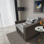 Fáni ágyneműtartós fotelágy mély földszürke szövet