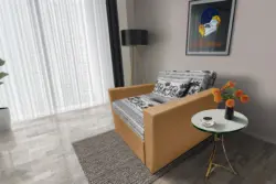 Fáni ágyneműtartós fotelágy okker szövet