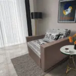 Fáni ágyneműtartós fotelágy pasztell taupe szövet