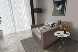 Fáni ágyneműtartós fotelágy pasztell taupe szövet