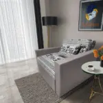 Fáni ágyneműtartós fotelágy szamárszürke szövet