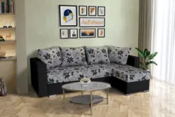 Virág ágyazható sarokülő fekete és Aroba virágos szövet