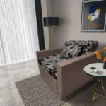 Virág ágyneműtartós fotelágy pasztell taupe szövet