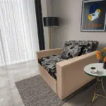 Virág ágyneműtartós fotelágy világos fahéj szövet