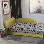 Aroba saroktámlás heverő őszi levélzöld színű szövet