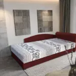 Elefántos saroktámlás heverő ágyneműtartóval ódon borvörös