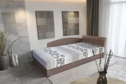 Elefántos saroktámlás heverő ágyneműtartóval pasztell taupe