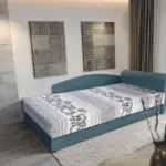 Elefántos saroktámlás heverő ágyneműtartóval szürkés kadét