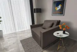 Mama ágyneműtartós fotelágy mély földszürke színben