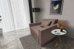 Mama ágyneműtartós fotelágy pasztell taupe színben