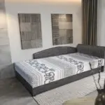 Elefántos saroktámlás heverő ágyneműtartóval sötét szürke zsákszövet