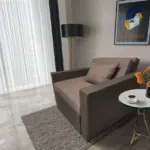 Mama ágyneműtartós fotelágy mély földszürke pasztell taupe színben
