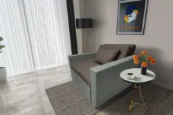 Mama ágyneműtartós fotelágy mély földszürke óezüst színben