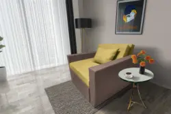 Mama ágyneműtartós fotelágy pasztell taupe száraz olíva színben