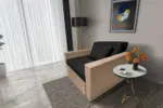 Mama ágyneműtartós fotelágy világos fahéj fekete színben